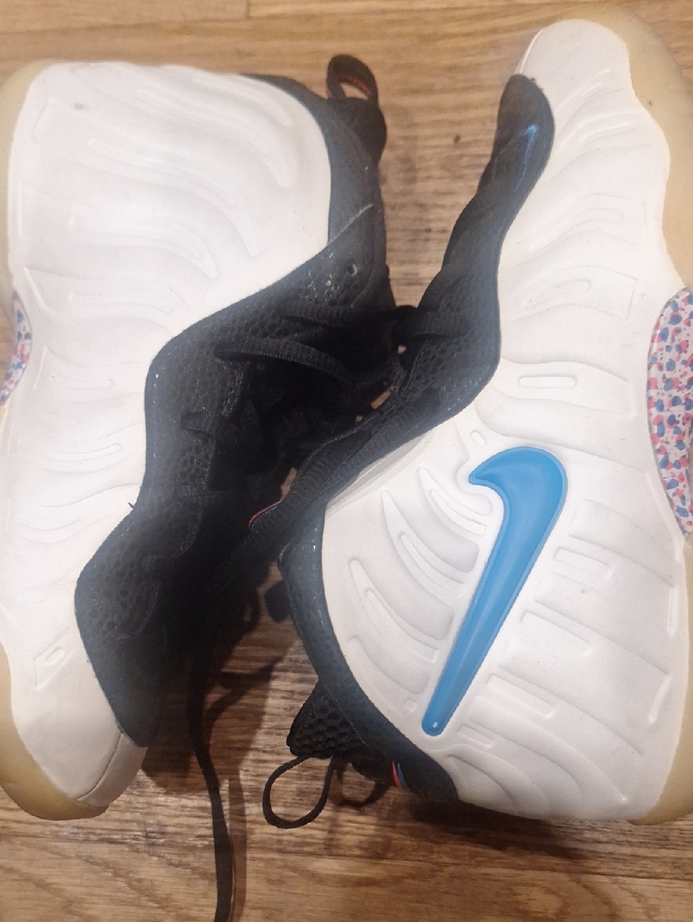 Nike Kids White and Black Foamposite Sneakers with Blue Swoosh